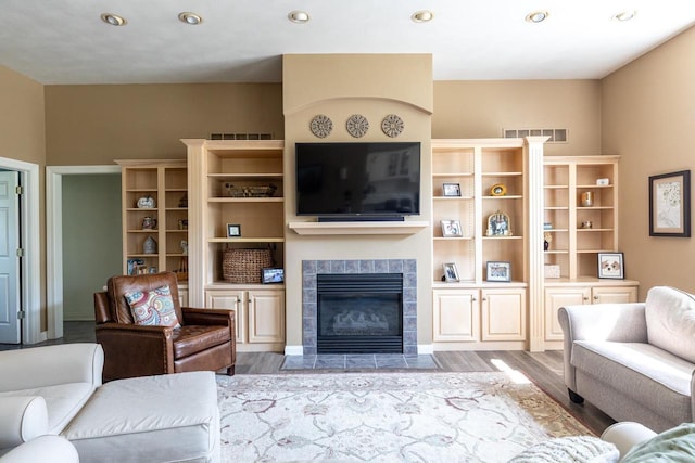 3864 Candlish Harbor Ln, Oshkosh, WI 54902 - living room with wood finished floors, recessed lighting, and a fireplace