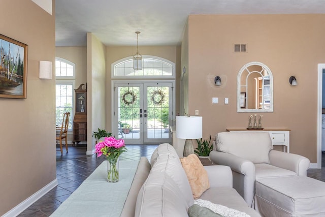 3864 Candlish Harbor Ln, Oshkosh, WI 54902 - living room with french doors and dark tile patterned floors