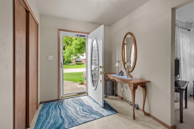 805 N Canterbury Dr, Appleton, WI 54915 - entryway featuring light colored carpet and baseboards