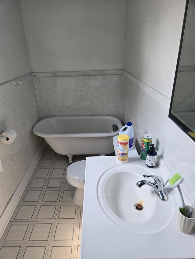 624 Depot St, Manawa, WI 54949 - bathroom with a freestanding tub and vanity
