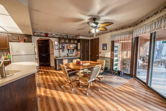 8420 Southview Dr, Crandon, WI 54520 - dining area with light wood-type flooring and ceiling fan