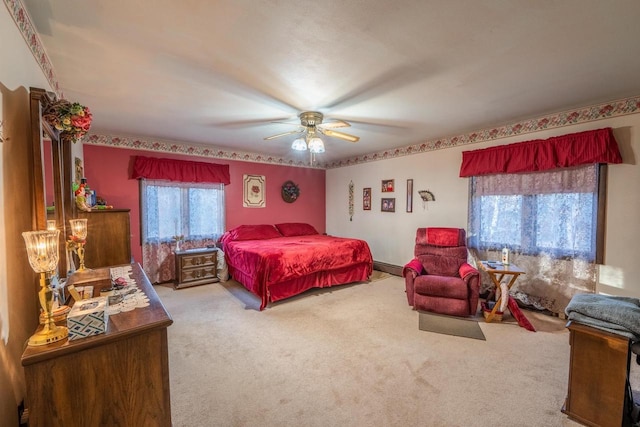 8420 Southview Dr, Crandon, WI 54520 - bedroom with carpet, multiple windows, and a ceiling fan