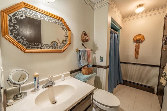 8420 Southview Dr, Crandon, WI 54520 - bathroom with baseboard heating, vanity, a shower with shower curtain, and tile patterned floors