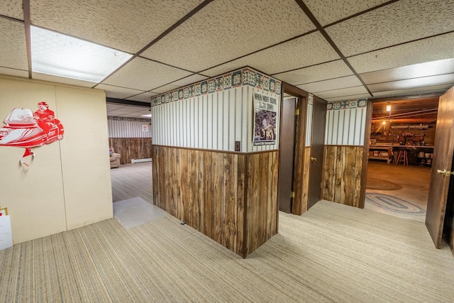 8420 Southview Dr, Crandon, WI 54520 - interior space with a drop ceiling, wooden walls, and carpet floors
