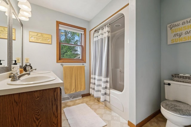 1434 Alcan Dr, Menasha, WI 54952 - bathroom with double vanity, shower / bath combo with shower curtain, and tile patterned floors