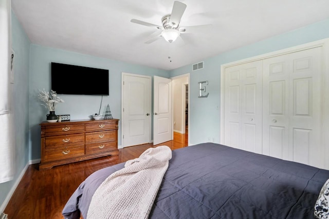 1434 Alcan Dr, Menasha, WI 54952 - bedroom with a closet, wood finished floors, and ceiling fan