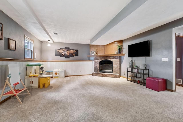 1434 Alcan Dr, Menasha, WI 54952 - unfurnished living room with carpet floors, a wainscoted wall, and a brick fireplace