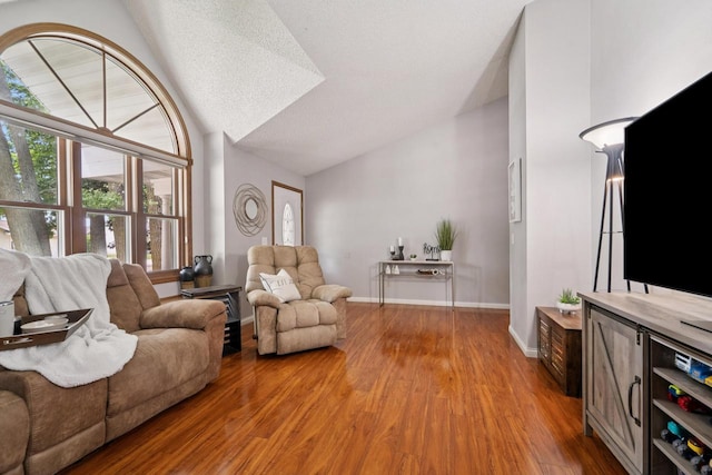 1434 Alcan Dr, Menasha, WI 54952 - living area featuring vaulted ceiling and light wood finished floors