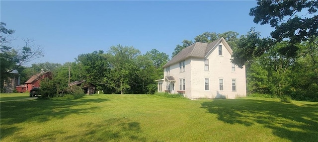 N3598 Nichols Rd, Black River Falls, WI 54615 - view of home's exterior with a lawn