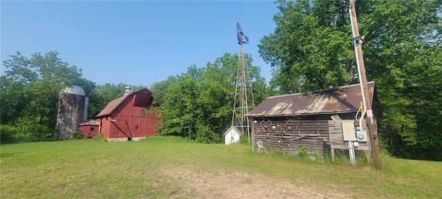 N3598 Nichols Rd, Black River Falls, WI 54615 - view of grassy yard with a barn and an outdoor structure