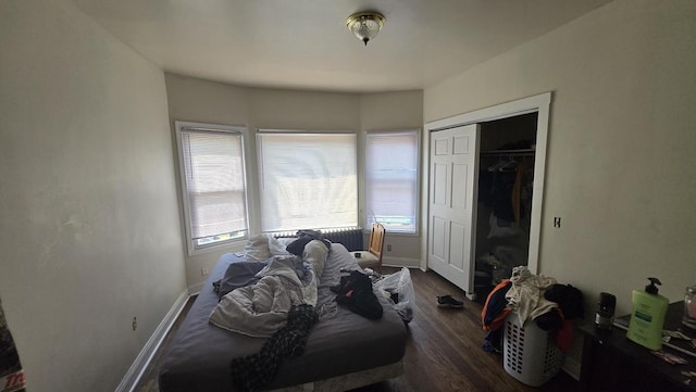 434 N 32nd St, Milwaukee, WI 53208 - bedroom featuring dark wood-type flooring and a closet