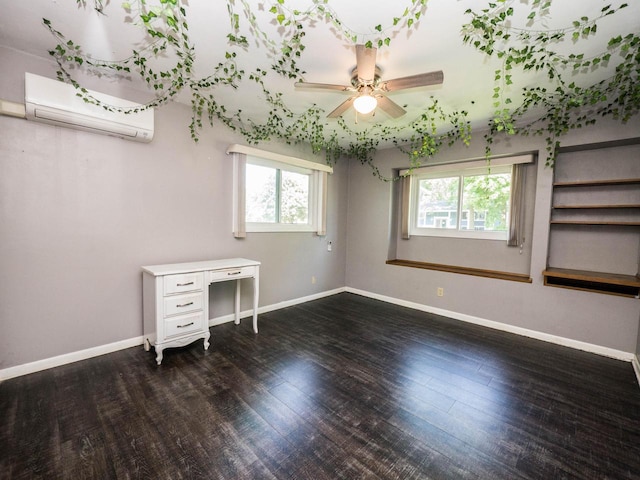 614 Decker Dr, West Bend, WI 53090 - unfurnished room with a wall mounted AC, healthy amount of natural light, a ceiling fan, and wood finished floors
