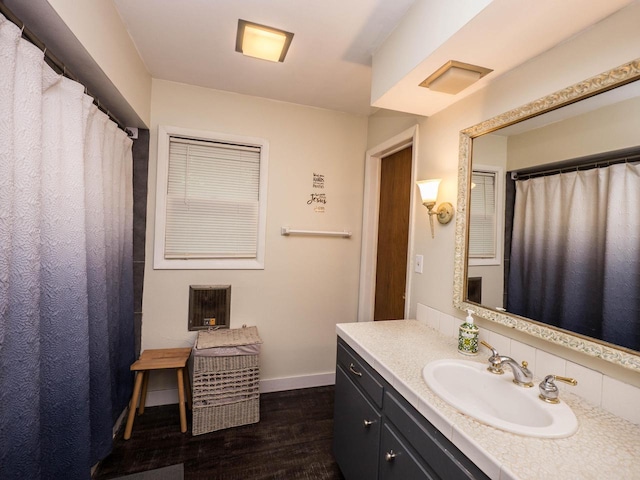 614 Decker Dr, West Bend, WI 53090 - full bath with vanity and wood finished floors