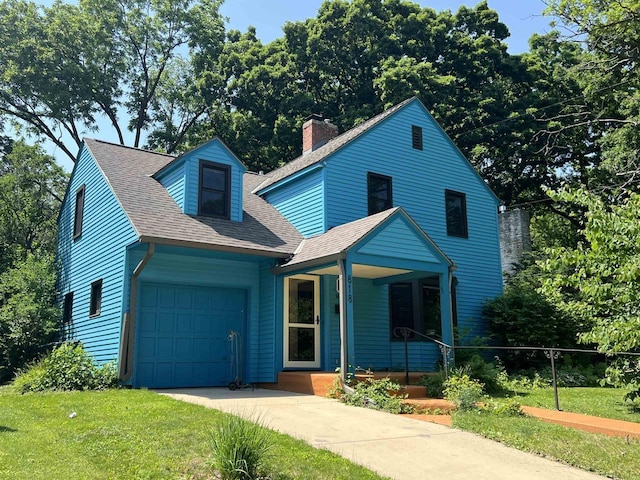 818 Ottawa Trl, Madison, WI 53711 - view of front of property with driveway, an attached garage, a shingled roof, a chimney, and a front lawn