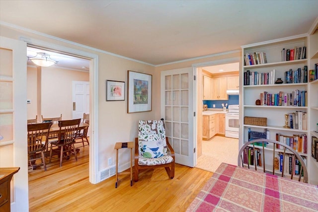 818 Ottawa Trl, Madison, WI 53711 - living area with light wood-type flooring and ornamental molding