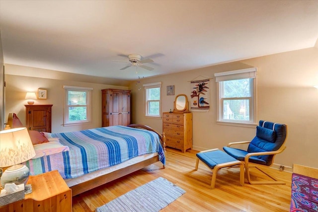 818 Ottawa Trl, Madison, WI 53711 - bedroom with light wood finished floors and ceiling fan