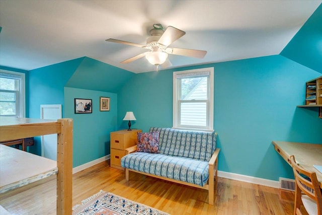 818 Ottawa Trl, Madison, WI 53711 - living area with lofted ceiling, wood finished floors, plenty of natural light, and ceiling fan