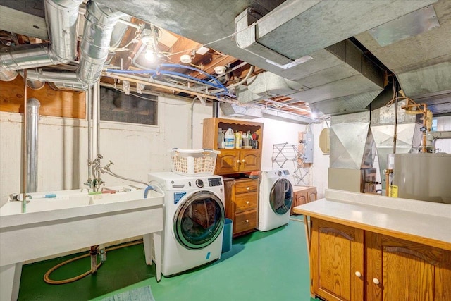 818 Ottawa Trl, Madison, WI 53711 - laundry area featuring washer and dryer, cabinet space, electric panel, and water heater