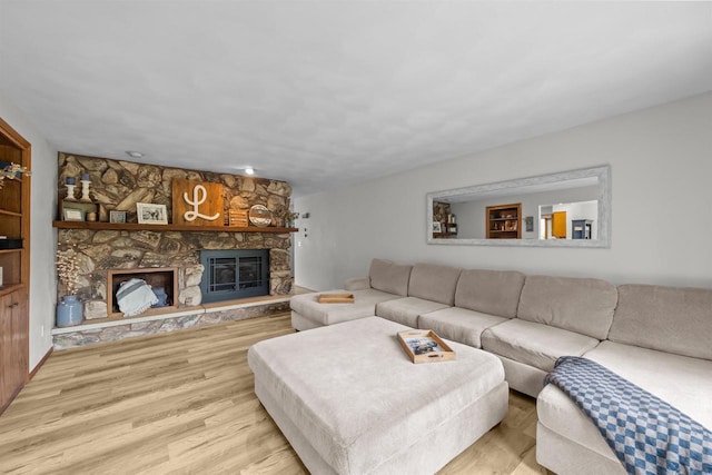 1341 Fieldstone Ct, Neenah, WI 54956 - living room featuring wood finished floors and a fireplace