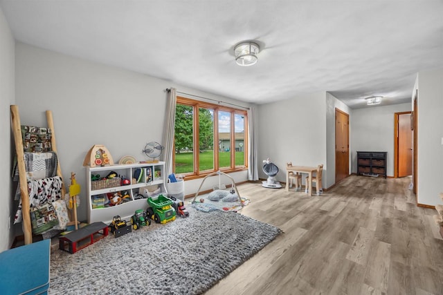 1341 Fieldstone Ct, Neenah, WI 54956 - game room featuring wood finished floors and baseboards