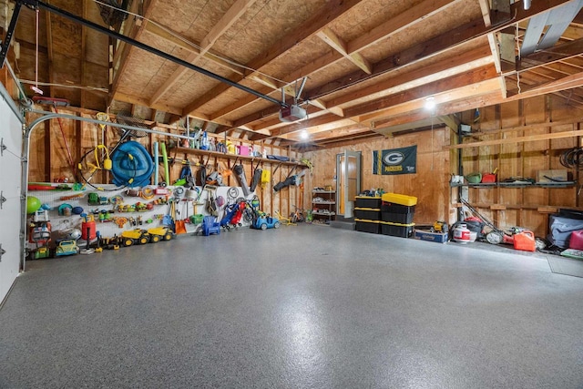 1341 Fieldstone Ct, Neenah, WI 54956 - garage featuring a garage door opener