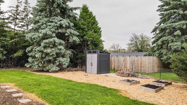 1341 Fieldstone Ct, Neenah, WI 54956 - view of yard featuring a storage unit and a vegetable garden