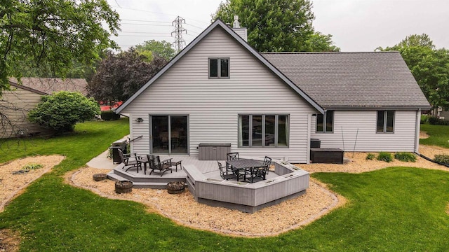 1341 Fieldstone Ct, Neenah, WI 54956 - rear view of property featuring a yard, a deck, and a chimney