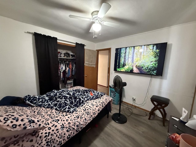 2342 Allied Dr Unit 1, Madison, WI 53711 - bedroom featuring wood finished floors, a closet, and a ceiling fan
