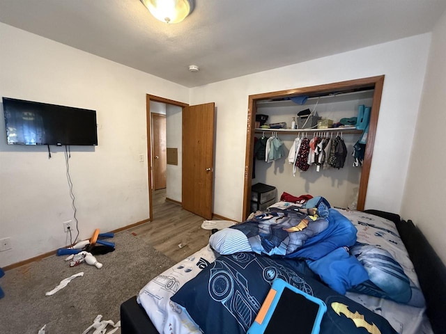 2342 Allied Dr Unit 1, Madison, WI 53711 - bedroom featuring a closet and wood finished floors