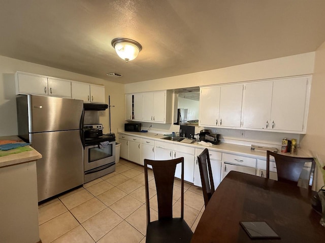 2342 Allied Dr Unit 4, Madison, WI 53711 - kitchen featuring stainless steel appliances, under cabinet range hood, white cabinets, light countertops, and light tile patterned flooring