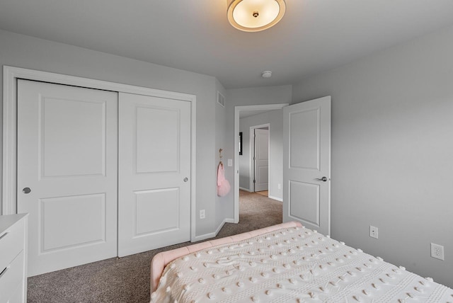 7845 W Mourning Dove Ln, Mequon, WI 53097 - carpeted bedroom featuring a closet and baseboards