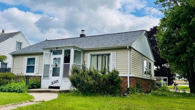 3315 E Allerton Ave, Cudahy, WI 53110 - bungalow featuring a shingled roof and a chimney