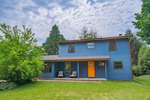 5043 Marathon Dr, Madison, WI 53705 - contemporary house with a front yard and a porch