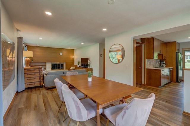 5043 Marathon Dr, Madison, WI 53705 - dining area with light wood-type flooring, recessed lighting, and a fireplace