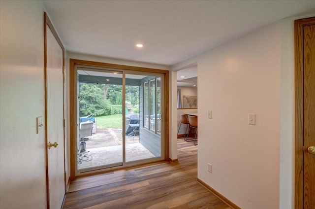 5043 Marathon Dr, Madison, WI 53705 - doorway to outside with light wood-style flooring and recessed lighting