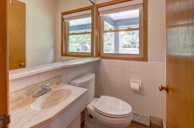 5043 Marathon Dr, Madison, WI 53705 - bathroom featuring tile walls and vanity