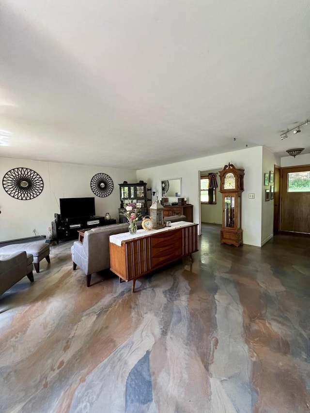 5116 S 84th St, Greendale, WI 53129 - living area featuring finished concrete flooring and track lighting