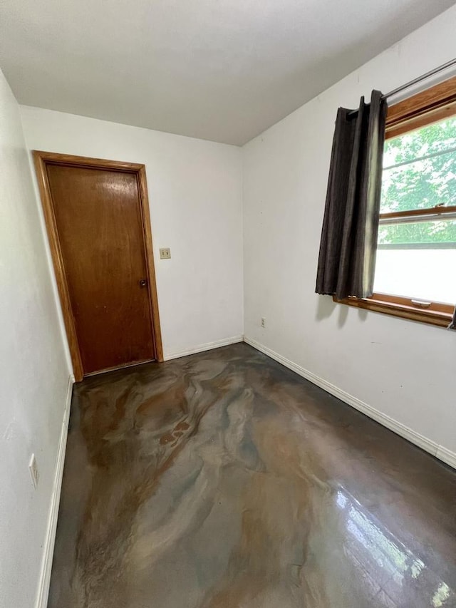 5116 S 84th St, Greendale, WI 53129 - unfurnished room featuring baseboards and concrete flooring