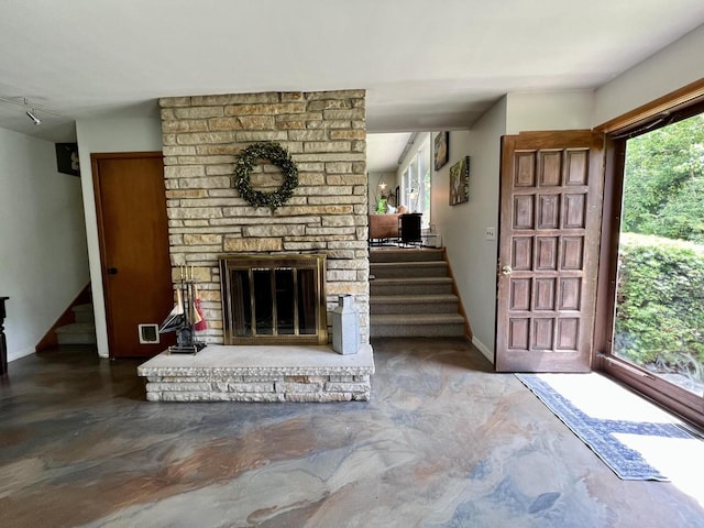 5116 S 84th St, Greendale, WI 53129 - foyer featuring stairway, plenty of natural light, and finished concrete floors