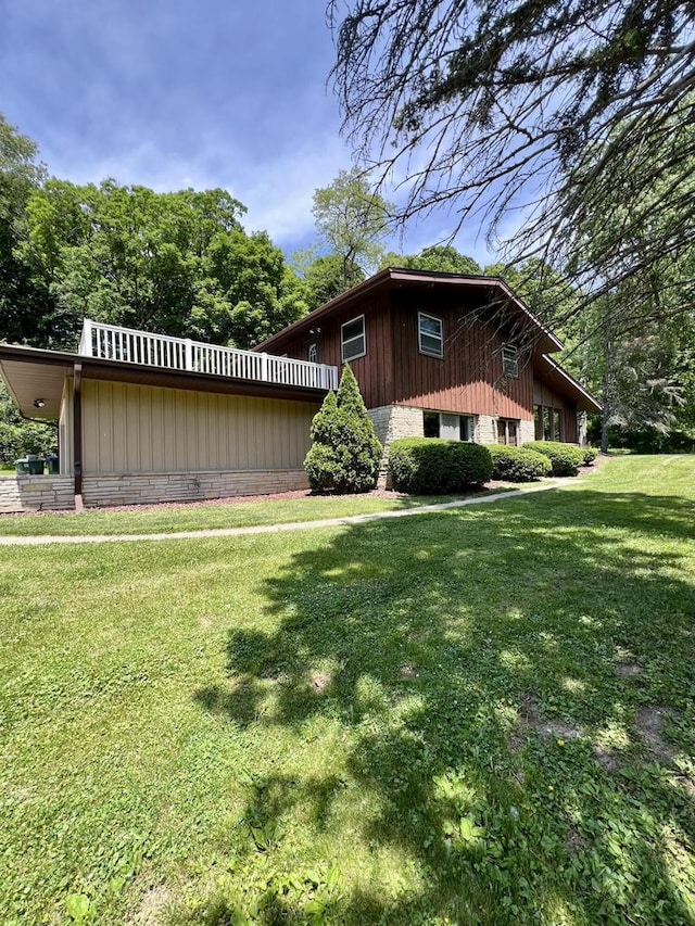 5116 S 84th St, Greendale, WI 53129 - view of home's exterior with a yard