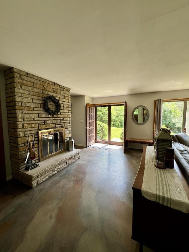 5116 S 84th St, Greendale, WI 53129 - living area with concrete flooring and a fireplace