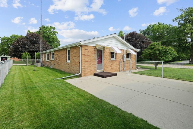 324 E Market St, Burlington, WI 53105 - view of front of house featuring brick siding and a patio