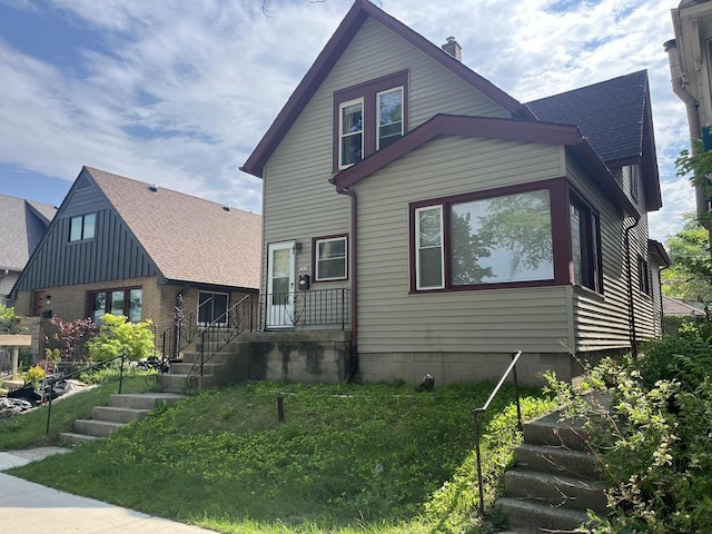 2928 N Humboldt Blvd Unit 2930, Milwaukee, WI 53212 - view of front of home featuring a chimney