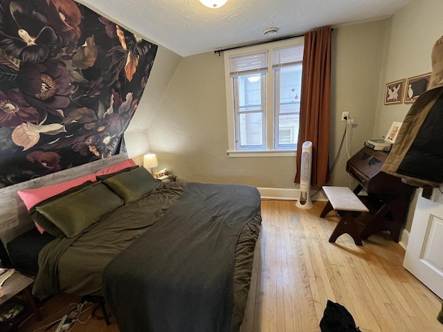 2928 N Humboldt Blvd Unit 2930, Milwaukee, WI 53212 - bedroom with wood-type flooring and baseboards