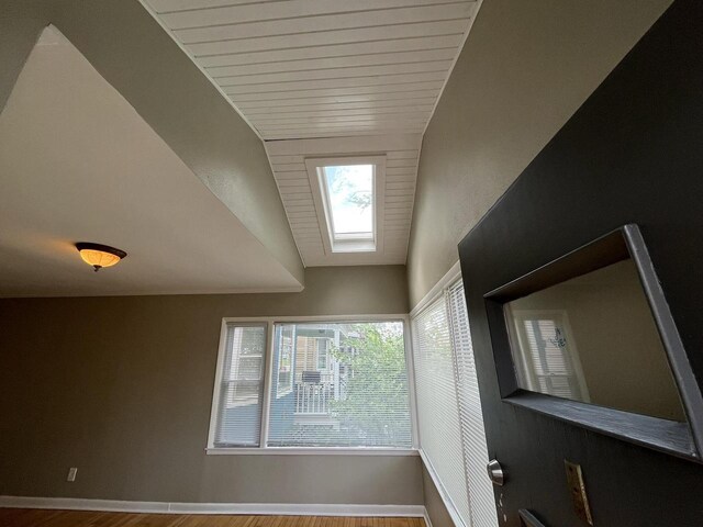 2928 N Humboldt Blvd Unit 2930, Milwaukee, WI 53212 - unfurnished room with lofted ceiling, plenty of natural light, and wood finished floors
