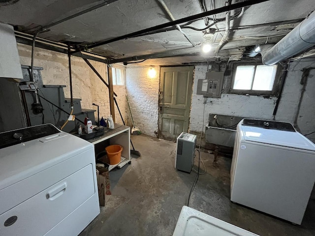 2928 N Humboldt Blvd Unit 2930, Milwaukee, WI 53212 - below grade area featuring electric panel and separate washer and dryer