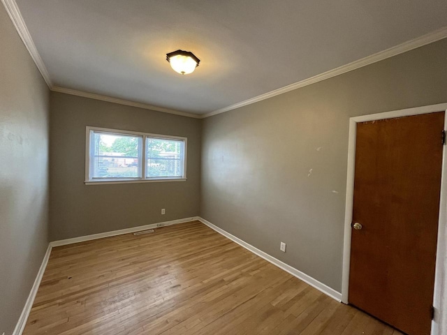 2928 N Humboldt Blvd Unit 2930, Milwaukee, WI 53212 - unfurnished room featuring light wood-style flooring and crown molding