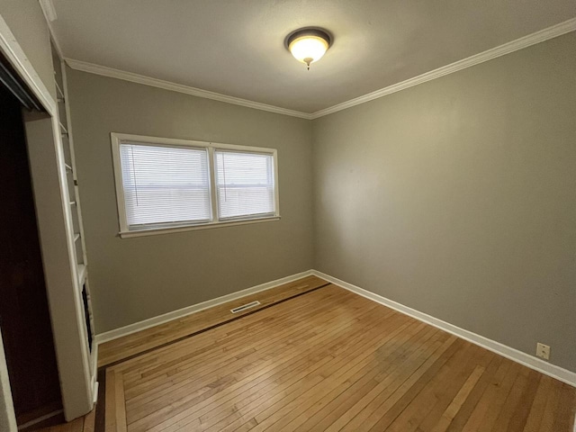 2928 N Humboldt Blvd Unit 2930, Milwaukee, WI 53212 - unfurnished bedroom with hardwood / wood-style flooring and ornamental molding