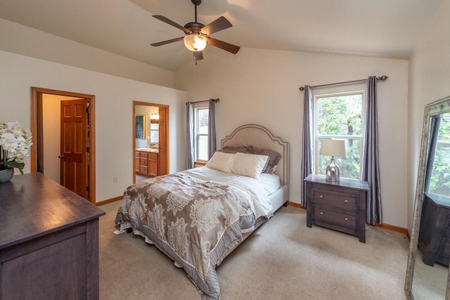431 Thurow Dr, Oconomowoc, WI 53066 - bedroom with vaulted ceiling, multiple windows, light colored carpet, and ceiling fan