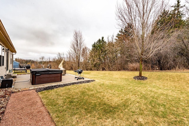 431 Thurow Dr, Oconomowoc, WI 53066 - view of green lawn featuring a hot tub and a patio